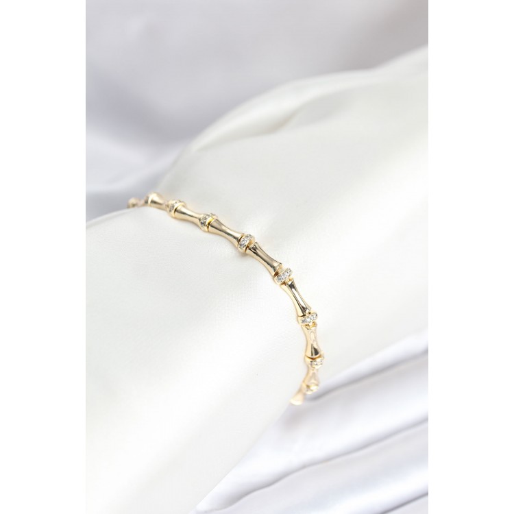 Pirinç Gold Renk Kemik Model Zirkon Taşlı Kadın Bileklik